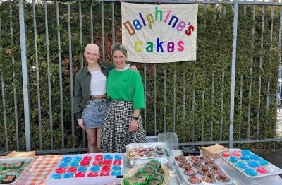 Teenagers running a bake sale fundraiser