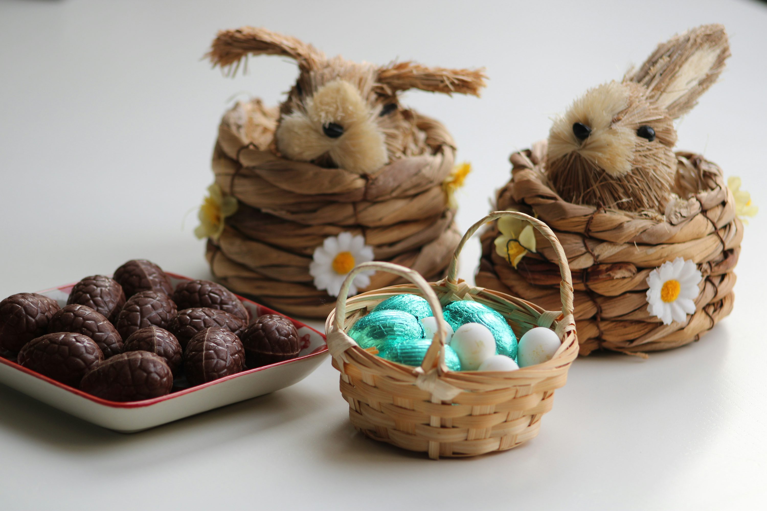 A basket of chocolate Easter eggs and bunnies, illustrating a doorstep Easter delivery business