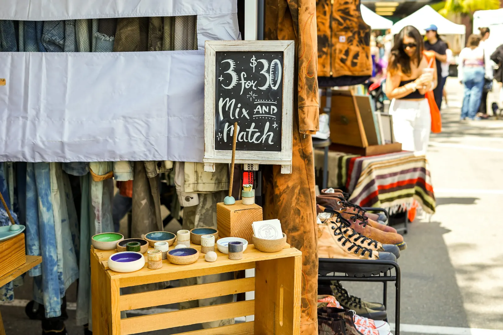 Handmade products displayed at a colourful small business market stall